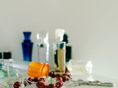 A table with a lot of bottles and spoons on it