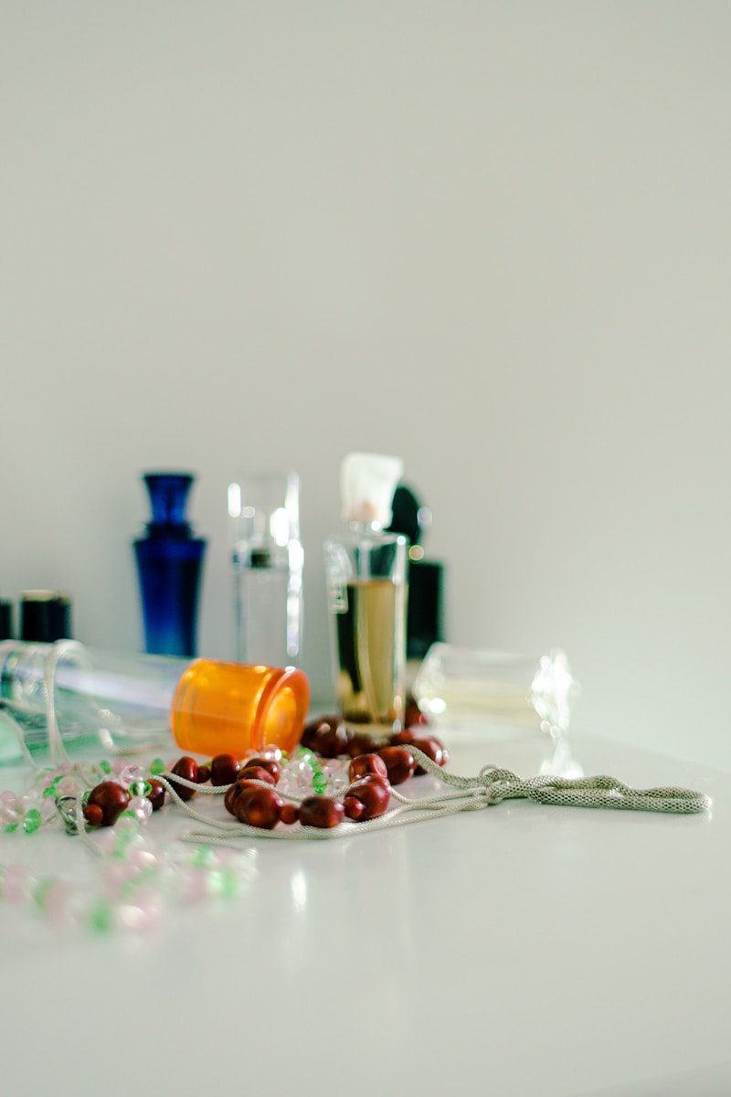 A table with a lot of bottles and spoons on it